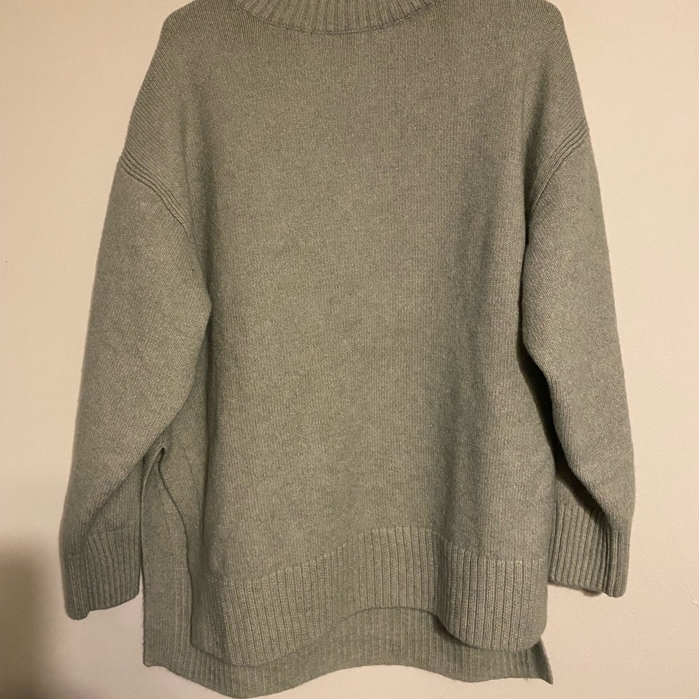 H&M XL mock turtleneck with slits down the sides.